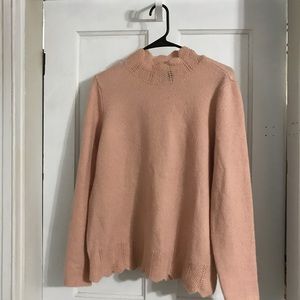 Woman’s large sweater